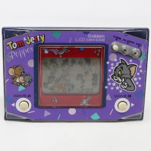 Juego de cartas electrónico portátil Gakken Tom & Jerry Popper de la década de 1980 con pantalla LCD, estilo retro, raro, de los años 80