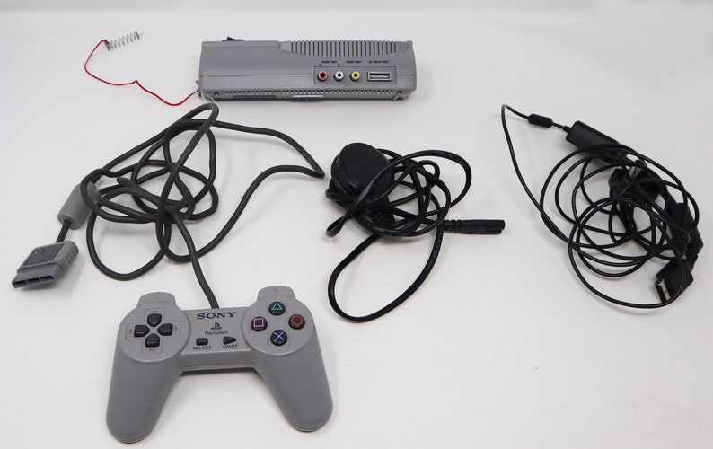 Vintage Sony Playstation 1 PS1 Pal Console SCPH-7502 Fully Working, Gamars Movie Card VCD Not Working Controllers 2 Games Lot Bundle image 6