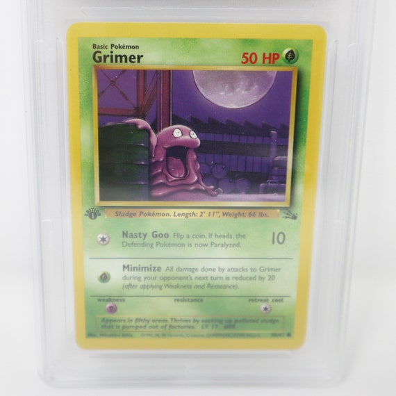 pokemon grimer card Grimer 57/82 Team Rocket Set Pokemon TCG Card In Protective Penny Slee –  The Game Experts main image 1