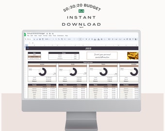 May include: A computer monitor displaying a 50/30/20 budget spreadsheet with the text 50/30/20 BUDGET XLS INSTANT DOWNLOAD above it. The screen shows a 2023 yearly overview with pie charts, income, needs, wants, and freedom categories.