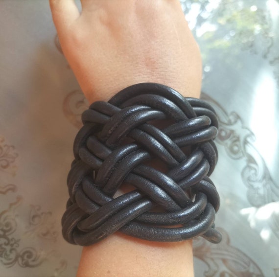 Dark woven bracelet deals