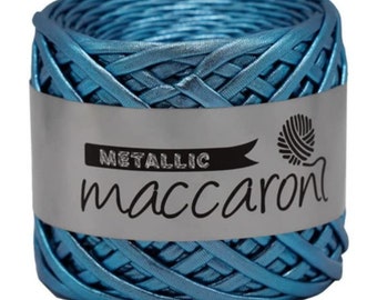 May include: A spool of metallic blue macaron yarn. The yarn is made of a braided ribbon and has a shiny finish. The label on the spool reads "Metallic macaron".