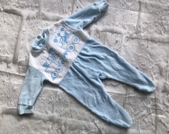 blue terry towelling sleepsuits