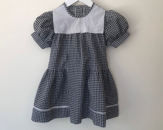 Girls black and white check dress 2025