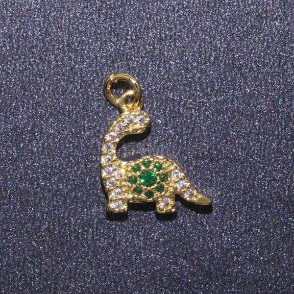 tiny brontosaurus Charm Gold dinosaur pendant. Jurassic animal extinct prehistoric charm. small jewelry. paleontologist