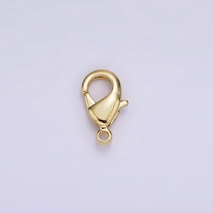 May include: Gold-toned metal lobster clasp for jewellery making. The clasp is a popular choice for necklaces, bracelets, and other jewellery projects.