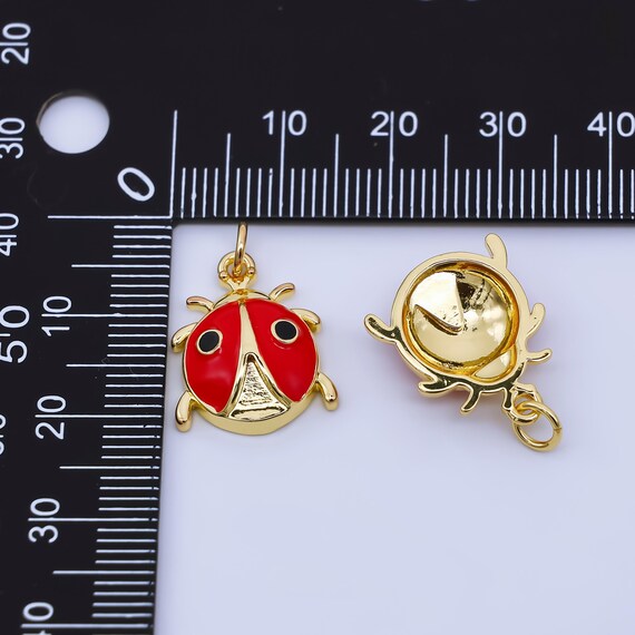 broche coccinelle couleur or émail rouge noir bijou rétro 2615