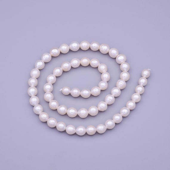 White Round Freshwater Cultured Pearl .10ct Diamond Post Earrings in Real 1 Real 14kt Yellow Gold 5-6mm White Round Freshwater Cultured Pearl