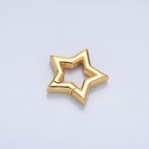 May include: Gold-toned star-shaped clasp for jewelry making. The clasp is open and ready to be attached to a necklace or bracelet.