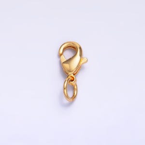 May include: Gold-toned metal lobster clasp with a jump ring. This clasp is used for jewelry making and is a popular choice for necklaces, bracelets, and other jewelry.