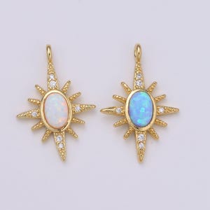 May include: Two gold starburst pendants with opal stones. The pendant on the left has a white opal stone, and the pendant on the right has a blue opal stone.