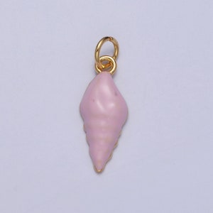 May include: A gold-colored charm in the shape of a pink seashell. The seashell has a spiral design and a smooth, glossy finish.