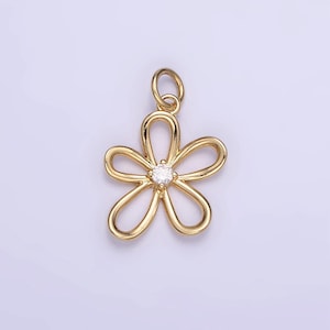 May include: A gold-tone flower charm with a clear rhinestone in the center. The charm has a loop at the top for attaching to a necklace or bracelet.