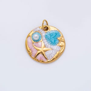 May include: A gold-toned pendant with a seashell design. The pendant features a starfish, a pearl, and a blue, pink, and white seashell design. The pendant has a loop at the top for a chain.