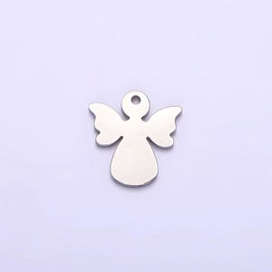 May include: Silver angel charm with a hole at the top for attaching to a necklace or bracelet.
