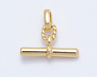 May include: A gold-colored toggle clasp with a bar and a loop, connected by a twisted rope design. The clasp is designed for jewelry making and is shown against a white background.