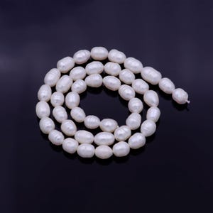 1 strand - aaa natural fresh water pearl beads white oval rice shape beads 6mm wholesale pearl beads strand wa-1330