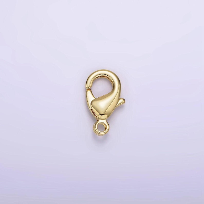 May include: Gold-toned metal lobster clasp for jewellery making. The clasp is a popular choice for necklaces, bracelets, and other jewellery projects.
