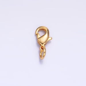 May include: Gold-toned metal lobster clasp with a ring attached. This clasp is used for jewelry making.