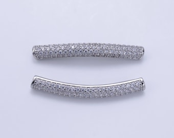 May include: Two silver-toned curved bar connectors with a clear crystal pave design.