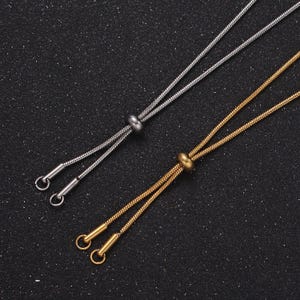 Halsband i rostfritt stål med guldfärgad ormlariat, justerbart dragkedja, fiskbenskedja, damhalsband, lariatberlock, presentsmycken för kvinnor wa2488