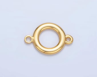 May include: Gold-toned metal connector with two loops. The connector is round with a smooth surface.
