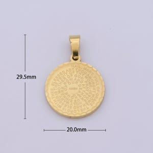 May include: Gold-toned metal pendant with a circular design featuring the text "Hail, Mary, full of grace..." in a circular pattern. The pendant measures 2.95 cm in diameter.