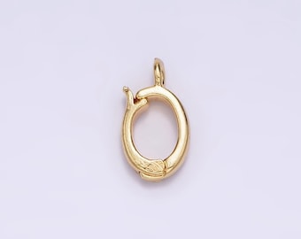 May include: Gold-toned metal clasp with a circular opening. The clasp is designed to be used for necklaces or bracelets.