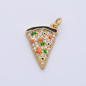 May include: A gold-colored pizza slice charm with a black crust, orange mushroom, green pepper, and clear crystal accents. The charm has a loop at the top for attaching to a necklace or bracelet.