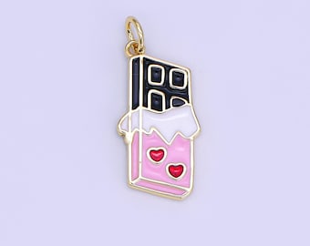 May include: A gold-colored charm in the shape of a chocolate bar. The bar is pink with two red heart accents. The chocolate squares are black, and the wrapper is white. The charm has a gold loop at the top for attaching to a necklace or bracelet.