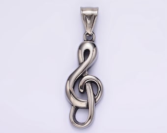 May include: A silver treble clef pendant charm. The charm is made of metal and has a smooth, polished finish.