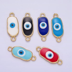 May include: Six gold-toned evil eye charms with different coloured enamel backgrounds. The charms are oval-shaped and have a loop on each end for attaching to jewellery or other crafts.