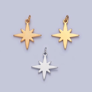 May include: Three gold and silver star-shaped charms with eight points. The charms are perfect for adding a touch of sparkle to jewelry projects.