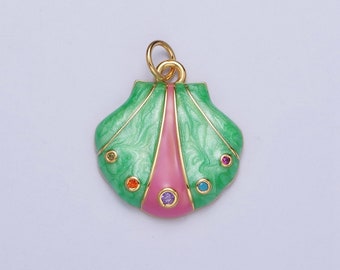 May include: A gold-tone pendant shaped like a seashell with green and pink enamel and colorful rhinestones.