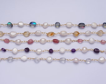 May include: A set of six necklaces featuring different colored beads and gold chain links. The necklaces are made with white pearls, iridescent blue, amber, pink, and purple beads.