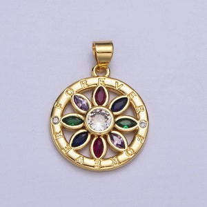 May include: Gold pendant necklace with a circular design featuring a flower with seven petals, each set with a different coloured gemstone. The pendant is inscribed with the word "FOREVER".