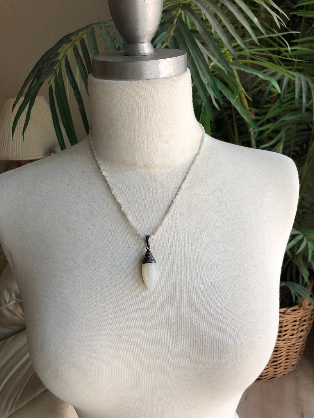 Rough Cut Diamond Necklace With a Carved Moonstone and Pave