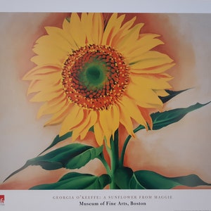 May include: A close-up of a yellow sunflower with a green center and orange petals. The sunflower is painted in a realistic style with visible brushstrokes. The background is a soft peach color.