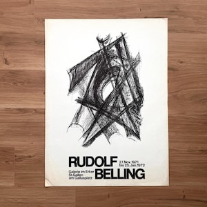 May include: A vintage art poster featuring a black abstract drawing on a white background. The poster includes the name "RUDOLF BELLING" in bold black letters, along with the dates "27.Nov.1971 bis 25.Jan.1972" and the location "Galerie im Erker St.Gallen am Gallusplatz."