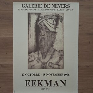 Puede incluir: Un cartel de exposición vintage de la Galerie de Nevers con un grabado en blanco y negro de una figura barbuda con turbante. El texto dice GALERIE DE NEVERS, 17 OCTOBRE - 18 NOVEMBRE 1978, EEKMAN (1889-1973) y el horario de la galería.