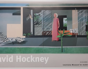 May include: A poster for an art exhibition featuring a painting by David Hockney. The painting depicts a woman in a pink dress standing in a modern home with large windows. The text on the poster reads "David Hockney" and "Louisiana Museum for moderne kunst".