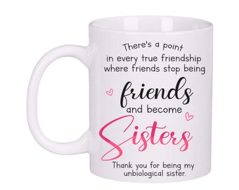 May include: White ceramic mug with a black and pink design. The mug reads "There's a point in every true friendship where friends stop being friends and become Sisters. Thank you for being my unbiological sister."
