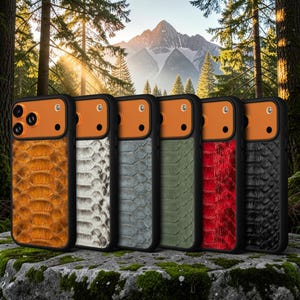 May include: Six smartphone cases arranged in a row, each featuring a black frame, an orange camera module, and a textured back panel in various colors including brown, white, gray, green, red, and black, mimicking a snakeskin pattern.