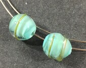 Two small aqua blue with silver metallic trim handmade lampwork beads for earrings Earring supply for craft makers Casual DIY bead set
