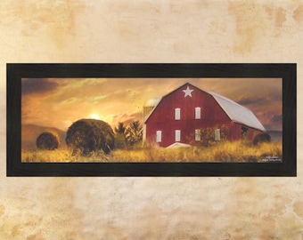 May include: A framed painting of a red barn with a white star on the side, set against a sunset sky. Hay bales are in the foreground, and the barn is surrounded by trees and fields.