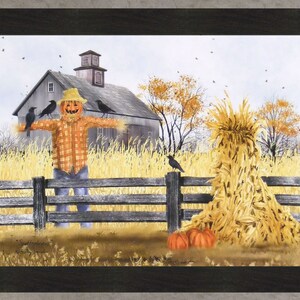 May include: A framed print depicts a fall scene with a scarecrow in an orange plaid shirt and a pumpkin head. Three black crows perch on the scarecrow and fence. A barn and a stack of wheat are in the background. Two pumpkins sit at the base of the wheat stack.