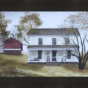 May include: A painting depicting a white farmhouse with a red barn in the background. The farmhouse features a porch with a rocking chair and a wreath on the door. The trees are bare and the sky is overcast.