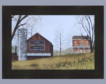 May include: A painting depicting a red barn with a white sign reading "CHEW MAIL POUCH TOBACCO TREAT YOURSELF TO THE BEST". A silo stands beside the barn, and a red brick house with a white porch is visible in the background. The artwork is framed in a dark wood frame.