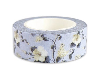 White floral washi tape on a light denim blue background - flower - nature - botanical - craft - stationery