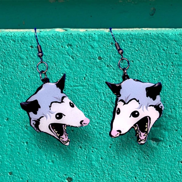 Screaming possum earrings, trash animal, aaaaa!